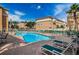 Relax at the sparkling community pool with plenty of lounge chairs and tables at 5030 Herring Ct, New Port Richey, FL 34652