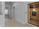 Hallway featuring a residential elevator, offering a blend of style and convenient accessibility at 5030 Herring Ct, New Port Richey, FL 34652