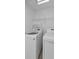 A laundry room with a white washer and dryer set at 5030 Herring Ct, New Port Richey, FL 34652