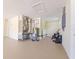 Neat garage showcasing water heater and HVAC system, with painted walls and tidy appearance at 5102 Peacock, Holiday, FL 34690