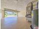 View from inside the garage looking towards the street and home across the street at 5102 Peacock, Holiday, FL 34690