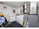 Utility room features a washer, dryer, and laundry sink at 5107 Pine St, Seffner, FL 33584