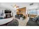Comfortable living room with tile flooring, ceiling fan, and modern decor at 5107 Pine St, Seffner, FL 33584