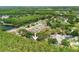 Aerial view of the neighborhood showcasing surrounding trees and neighboring houses in the area at 5346 Black Pine Dr, Tampa, FL 33624