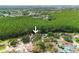Aerial view with an arrow points to the home, surrounded by lush landscape and neighborhood at 5346 Black Pine Dr, Tampa, FL 33624