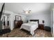 Spacious bedroom featuring light walls, wood-look floors and ceiling fan at 5346 Black Pine Dr, Tampa, FL 33624