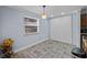 Breakfast nook with natural light, tiled floors, and pantry storage at 5346 Black Pine Dr, Tampa, FL 33624