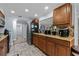 Open kitchen with stainless steel appliances, wood cabinets and eat-in space at 5346 Black Pine Dr, Tampa, FL 33624