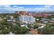 Expansive aerial view featuring the city, waterfront, and surrounding residential areas amid lush greenery at 700 Beach Ne Dr # 606, St Petersburg, FL 33701