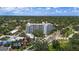 Breathtaking aerial perspective of the condo, displaying its architectural elegance within a leafy residential environment at 700 Beach Ne Dr # 606, St Petersburg, FL 33701