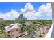 Scenic city view from the balcony, showcasing the city skyline and surrounding neighborhoods at 700 Beach Ne Dr # 606, St Petersburg, FL 33701