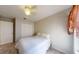 A cozy bedroom with a light-colored closet and neutral carpet at 7010 Kendall Heath Way, Land O Lakes, FL 34637