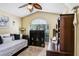 Cozy bedroom with a large window, neutral carpet, and a versatile daybed for relaxing and working at 7101 Bucks Ford Dr, Riverview, FL 33578