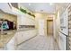 Bright kitchen boasting sleek white cabinetry and stainless steel appliances at 7101 Bucks Ford Dr, Riverview, FL 33578