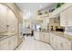 Kitchen area with granite counters, brick accents, and plenty of cabinet space at 7101 Bucks Ford Dr, Riverview, FL 33578