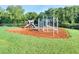 Community playground with slides and climbing structures at 7101 Bucks Ford Dr, Riverview, FL 33578