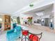 Modern kitchen with granite countertop, stainless steel appliances and breakfast bar seating at 7111 Lawnview Ct, Tampa, FL 33615