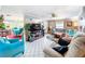 Open concept living area with seamless flow to dining space, perfect for entertaining at 7111 Lawnview Ct, Tampa, FL 33615