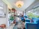Inviting living room with plush seating, stylish decor, and view into dining room at 7111 Lawnview Ct, Tampa, FL 33615