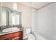 Bright bathroom featuring a single sink with granite countertop and a shower-tub combination at 7211 Ozello Trail Ave, Sun City Center, FL 33573