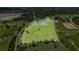 Vast estate featuring a home, pond, surrounding greenery, and ample space for outdoor activities at 7301 Loghouse Rd, Plant City, FL 33565