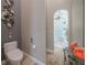 Comfort height toilet and decorative accents adorn this beautifully designed bathroom at 7301 Loghouse Rd, Plant City, FL 33565