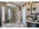 Spacious bathroom featuring granite counters, a walk-in shower, and neutral decor at 7301 Loghouse Rd, Plant City, FL 33565