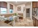 Bright breakfast nook with banquette seating and natural light from large windows at 7301 Loghouse Rd, Plant City, FL 33565