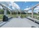 Waterside deck perfect for relaxation, with seating and views of the lush pond and natural surroundings at 7301 Loghouse Rd, Plant City, FL 33565