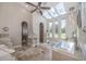 This main bathroom features skylights, a soaking tub, and walk-in shower at 7301 Loghouse Rd, Plant City, FL 33565