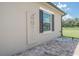 Outdoor shower featuring modern fixtures and brick-paved ground, perfect for rinsing off after enjoying the outdoors at 7301 Loghouse Rd, Plant City, FL 33565