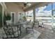 Enjoy outdoor dining on this screened patio with a view of the pool at 7301 Loghouse Rd, Plant City, FL 33565