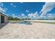 Enjoy the outdoors in this beautiful backyard and pool area at 7301 Loghouse Rd, Plant City, FL 33565