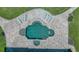 An aerial view of the custom backyard pool with in-pool seating and an expansive patio at 7301 Loghouse Rd, Plant City, FL 33565