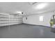 Spacious garage with an automatic door and ample space for vehicles and storage at 734 Flamingo Dr, Apollo Beach, FL 33572