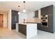 A sleek kitchen features a stylish island, stainless appliances, and pendant lighting for a modern look at 777 3Rd N Ave # 1607, St Petersburg, FL 33701