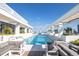 Bask in the sun by the rooftop pool, surrounded by modern lounge furniture and lush greenery at 777 3Rd N Ave # 1607, St Petersburg, FL 33701