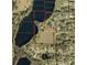 Aerial view of property lines highlighting the parcel's position near the lake and surrounding neighborhood at 820 Newberger Rd, Lutz, FL 33549