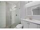 Bathroom featuring a tiled walk-in shower, modern vanity, and neutral color scheme at 8526 Quarter Horse Dr, Riverview, FL 33578