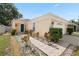 Inviting one-story home featuring a nicely landscaped front yard and a cozy, welcoming facade at 8526 Quarter Horse Dr, Riverview, FL 33578