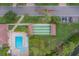 Overhead view of shuffleboard court, community pool and parking area at 8701 40Th N Ln, Pinellas Park, FL 33782