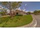 Villa featuring manicured landscaping and a well-maintained lawn at 8701 40Th N Ln, Pinellas Park, FL 33782