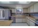 Well-maintained kitchen features stainless steel appliances and ample cabinet space at 8701 40Th N Ln, Pinellas Park, FL 33782