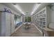 Charming community library featuring ample bookshelves, a cozy seating area, and natural light at 8701 40Th N Ln, Pinellas Park, FL 33782