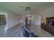 Open living space flows into the kitchen and includes space for an office setup at 8701 40Th N Ln, Pinellas Park, FL 33782