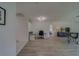 Spacious living room with a printer setup and an entertainment center at 8701 40Th N Ln, Pinellas Park, FL 33782