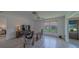 Open living room with natural light and views of the yard at 8701 40Th N Ln, Pinellas Park, FL 33782