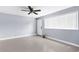 Bright, expansive bedroom with a large window providing ample natural light and tiled floors at 9310 N 12Th St, Tampa, FL 33612