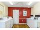 Convenient on-site laundry room with multiple washers and dryers for residents at 940 Virginia St # 303, Dunedin, FL 34698