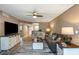 Spacious living room featuring modern decor, hard wood floors, and an open layout at 940 Virginia St # 303, Dunedin, FL 34698